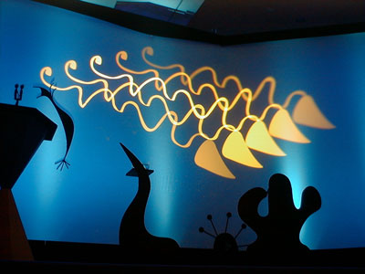 Miro inspired
            stage set. Lighting by Iain Henshaw